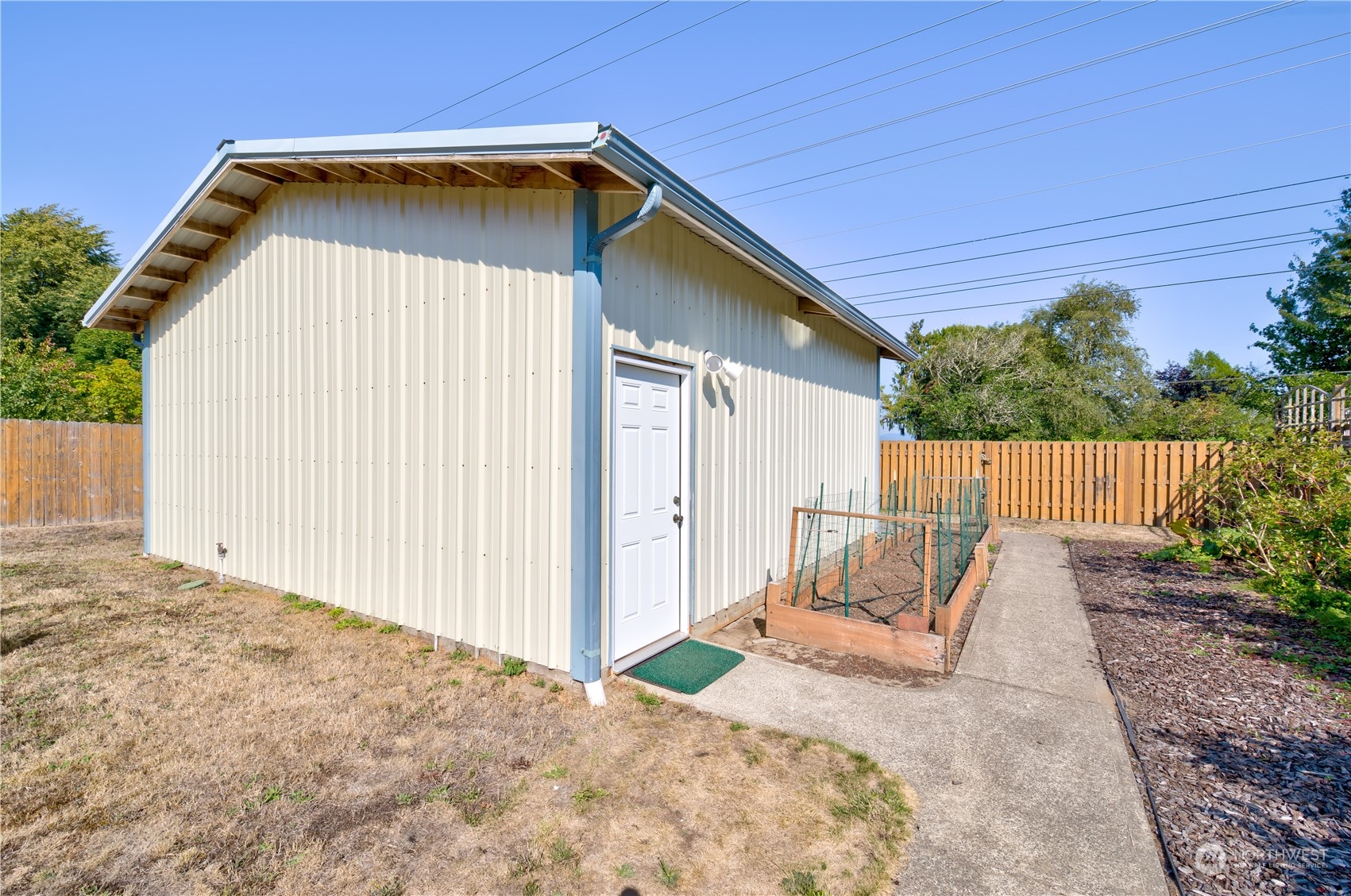26507 Sandridge Road Nahcotta, WA 98640 - Photo 16 of 40 a house with trees in front of it