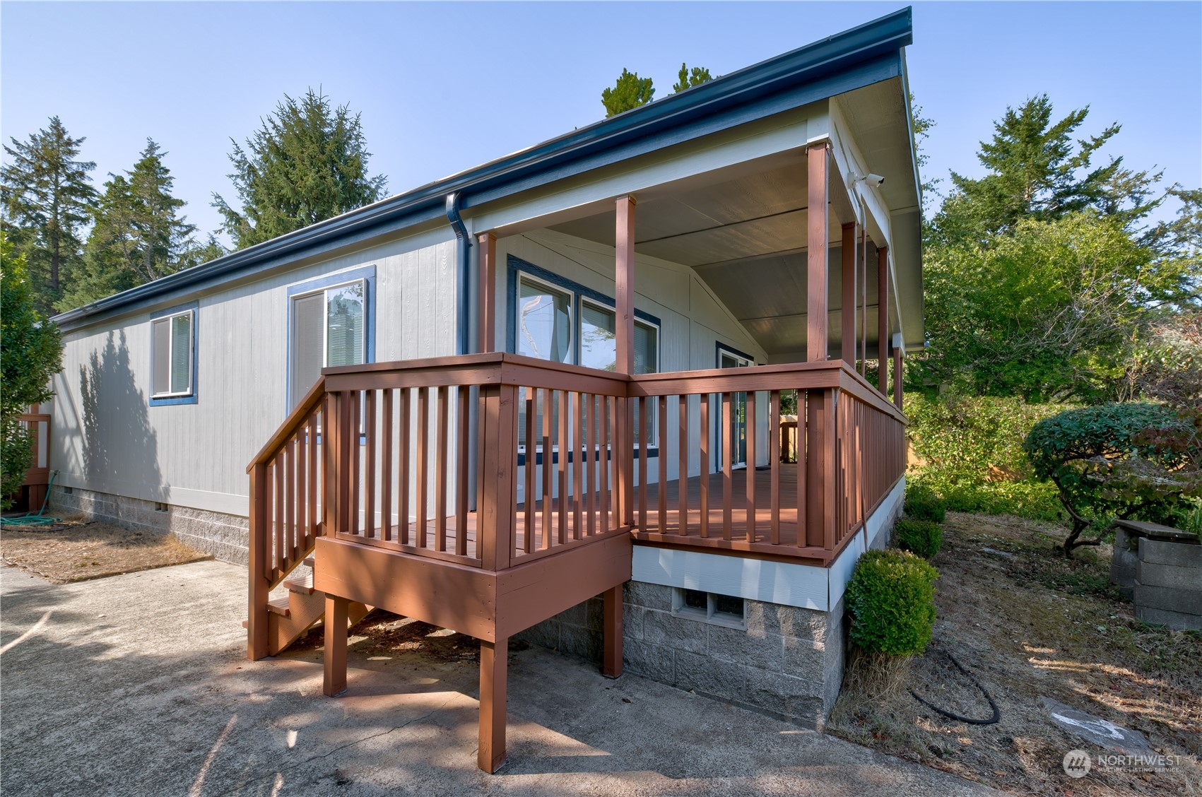 26507 Sandridge Road Nahcotta, WA 98640 - Photo 18 of 40 a view of a house with a yard and sitting area