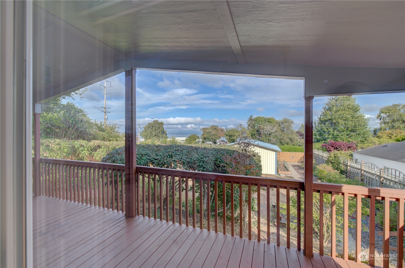 26507 Sandridge Road Nahcotta, WA 98640 - Photo 20 of 40 a view of a balcony with wooden floor