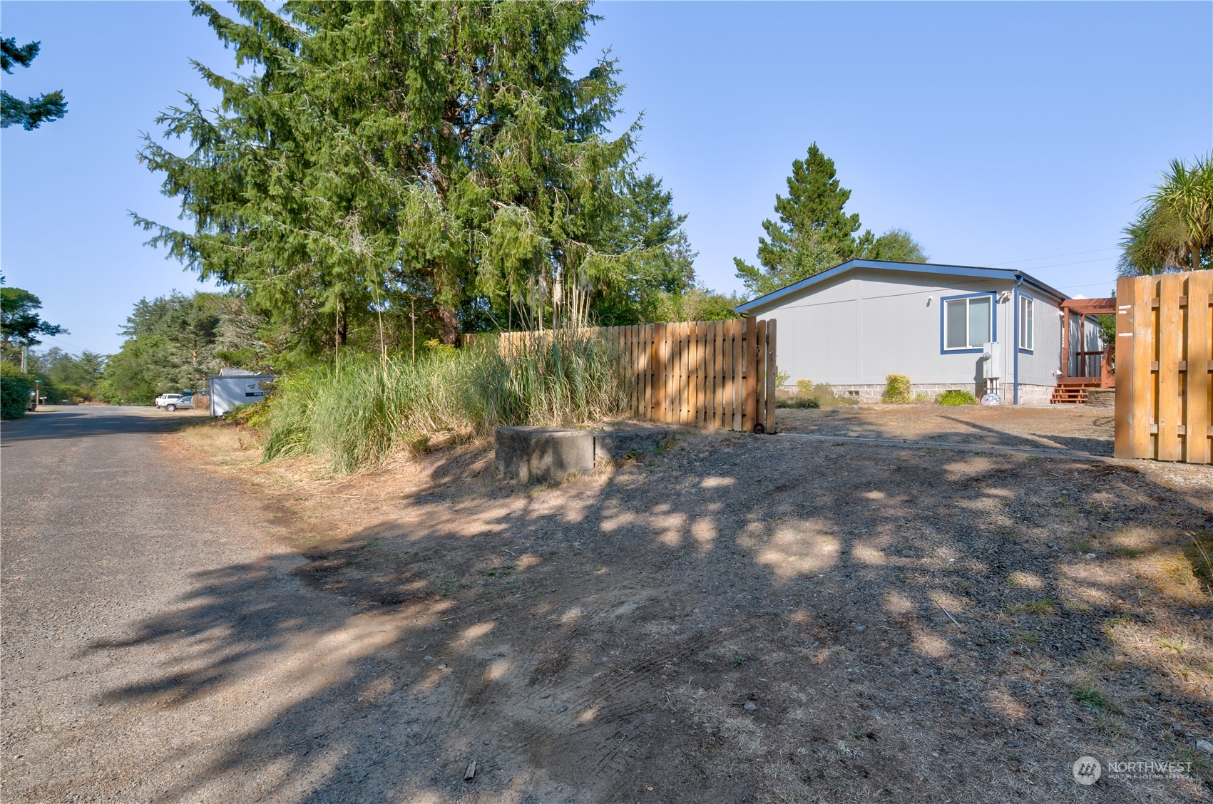 26507 Sandridge Road Nahcotta, WA 98640 - Photo 2 of 40 a view of a house with a yard