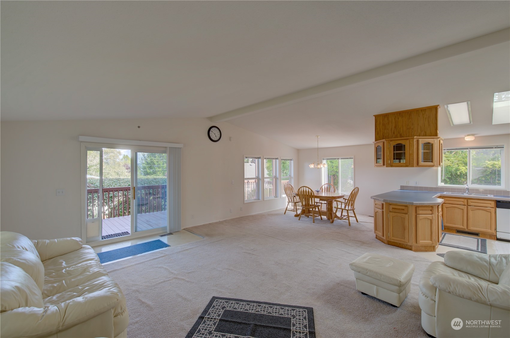 26507 Sandridge Road Nahcotta, WA 98640 - Photo 21 of 40 a living room with furniture and a large window