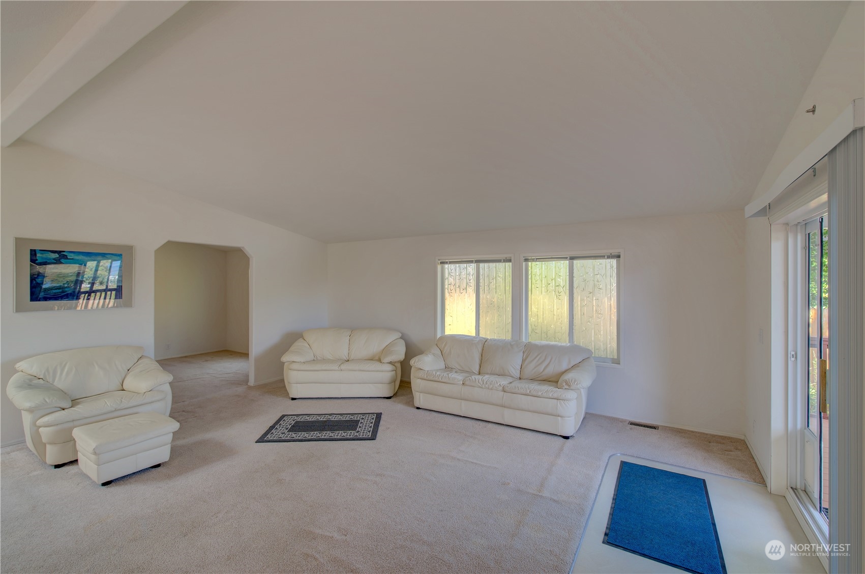 26507 Sandridge Road Nahcotta, WA 98640 - Photo 22 of 40 a living room with furniture and a window