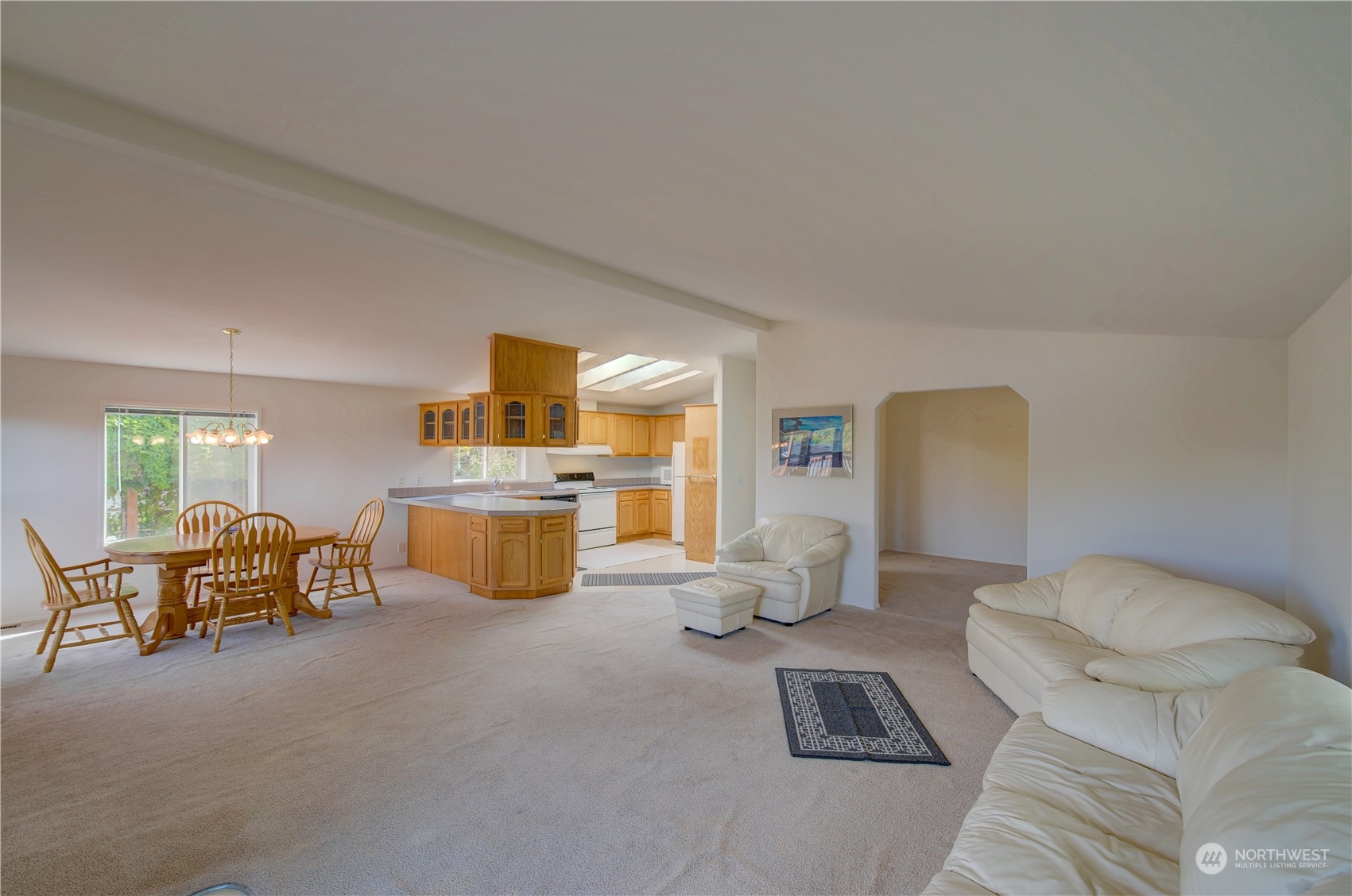 26507 Sandridge Road Nahcotta, WA 98640 - Photo 23 of 40 a living room with furniture and a couch