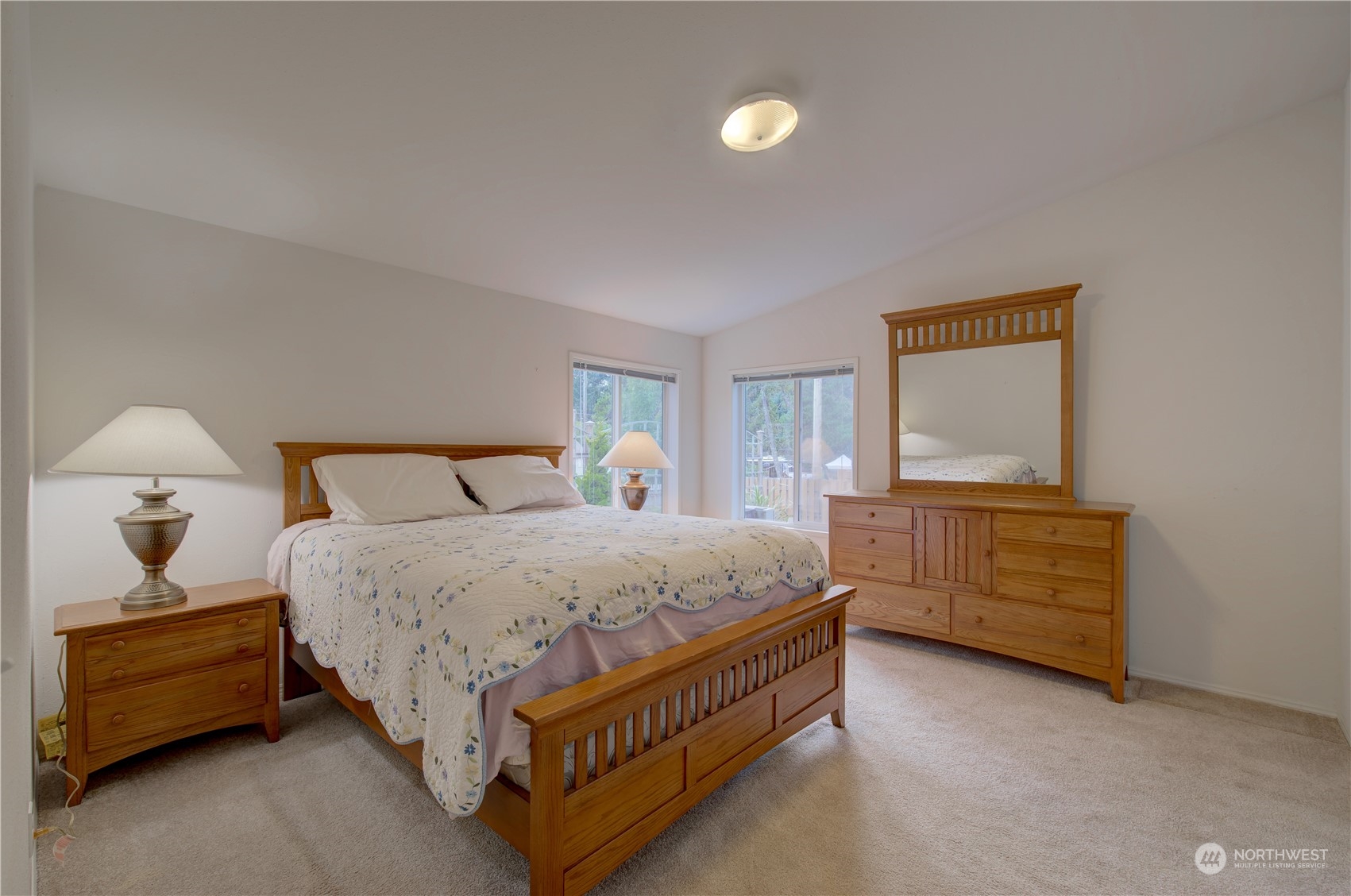 26507 Sandridge Road Nahcotta, WA 98640 - Photo 30 of 40 a bed room with a bed and window