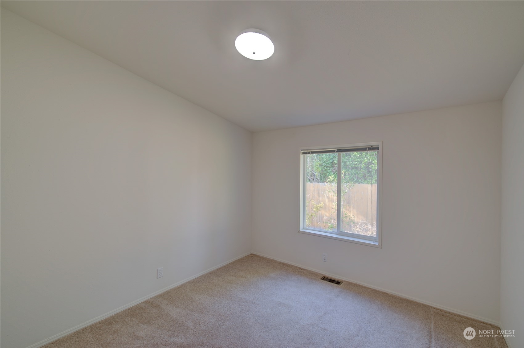 26507 Sandridge Road Nahcotta, WA 98640 - Photo 34 of 40 an empty room with a window