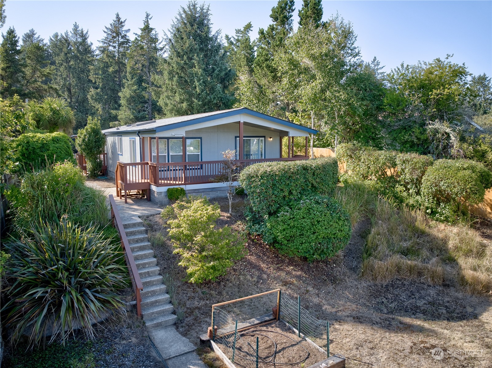 26507 Sandridge Road Nahcotta, WA 98640 - Photo 10 of 40 a front view of a house with a yard