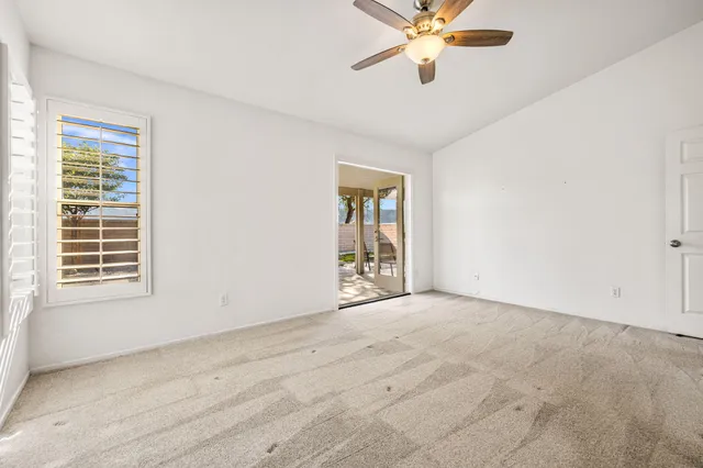 a bathroom with a double vanity sink and mirror