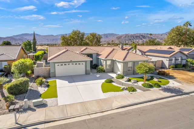 a view of a house with a swimming pool