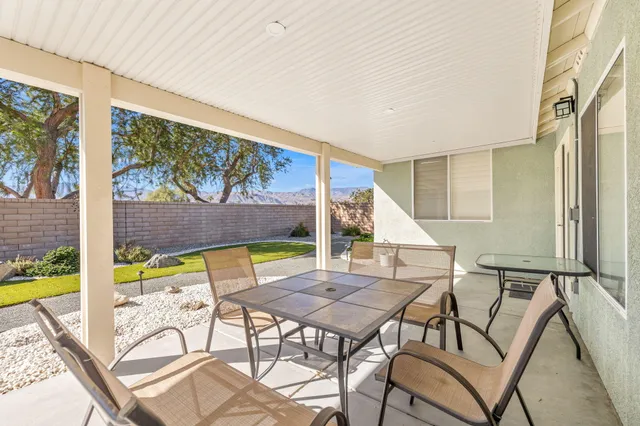 a view of swimming pool with a patio