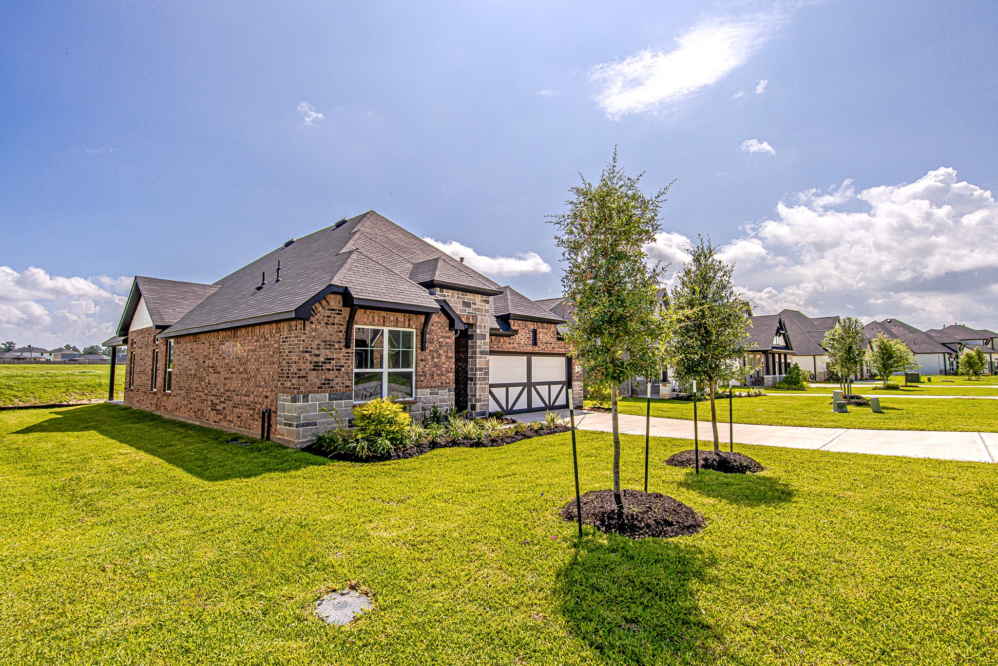 157 Peninsula Point Drive Montgomery, TX 77356 - Photo 2 of 33 a front view of a house with a yard