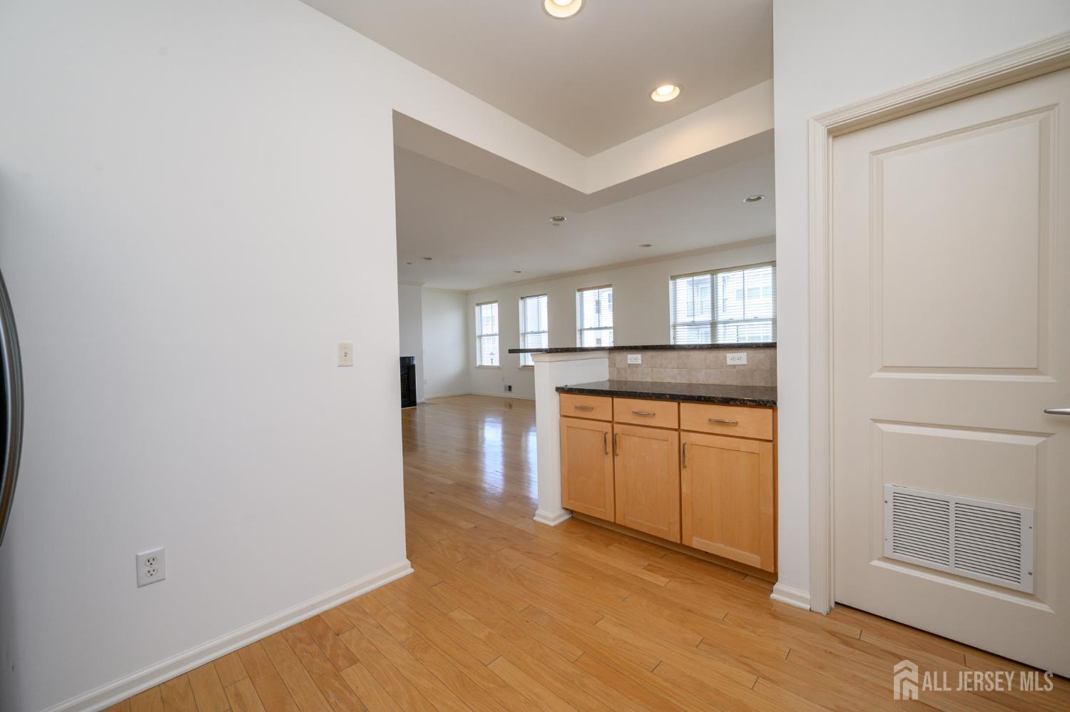 361 Lehigh Avenue Perth Amboy, NJ 08861 - Photo 11 of 28 a view of a kitchen cabinets and wooden floor