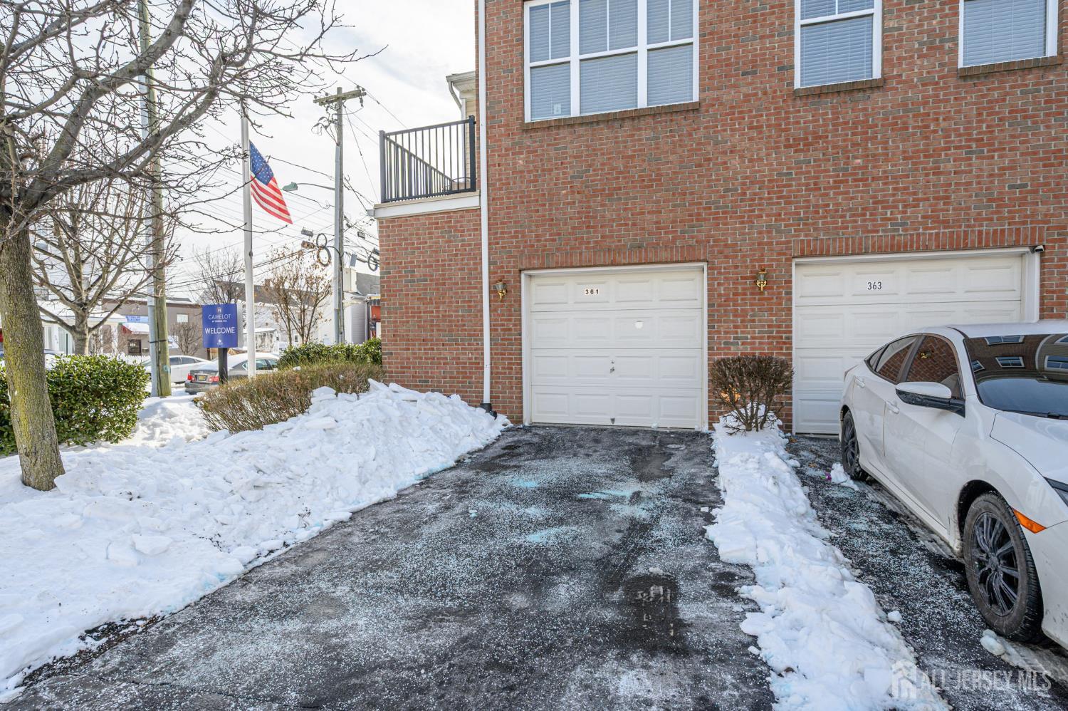 361 Lehigh Avenue Perth Amboy, NJ 08861 - Photo 27 of 28 a front view of a house with parking