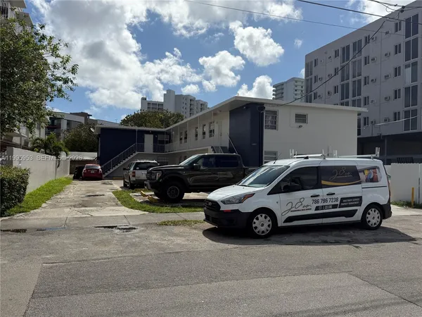 a car parked in front of a building