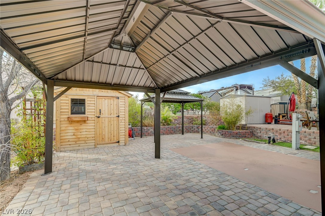 866 Sparrow Way Boulder City, NV 89005 - Photo 7 of 25 View of patio with a shed and a gazebo