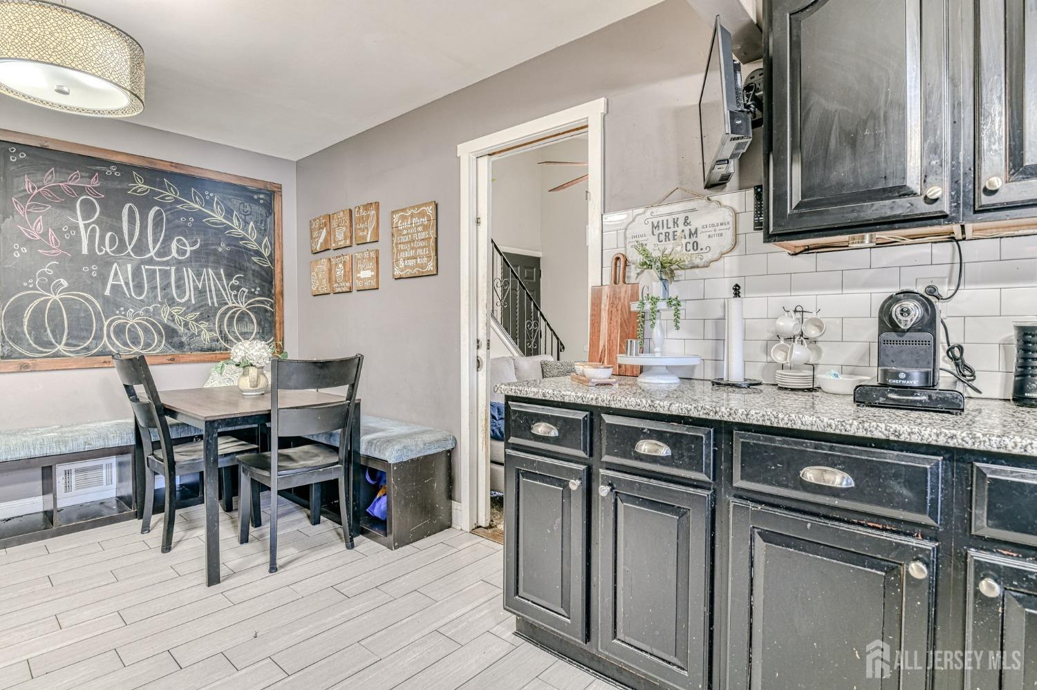 52 Owens Road Old Bridge, NJ 08857 - Photo 16 of 39 a kitchen with stainless steel appliances granite countertop a sink and cabinets