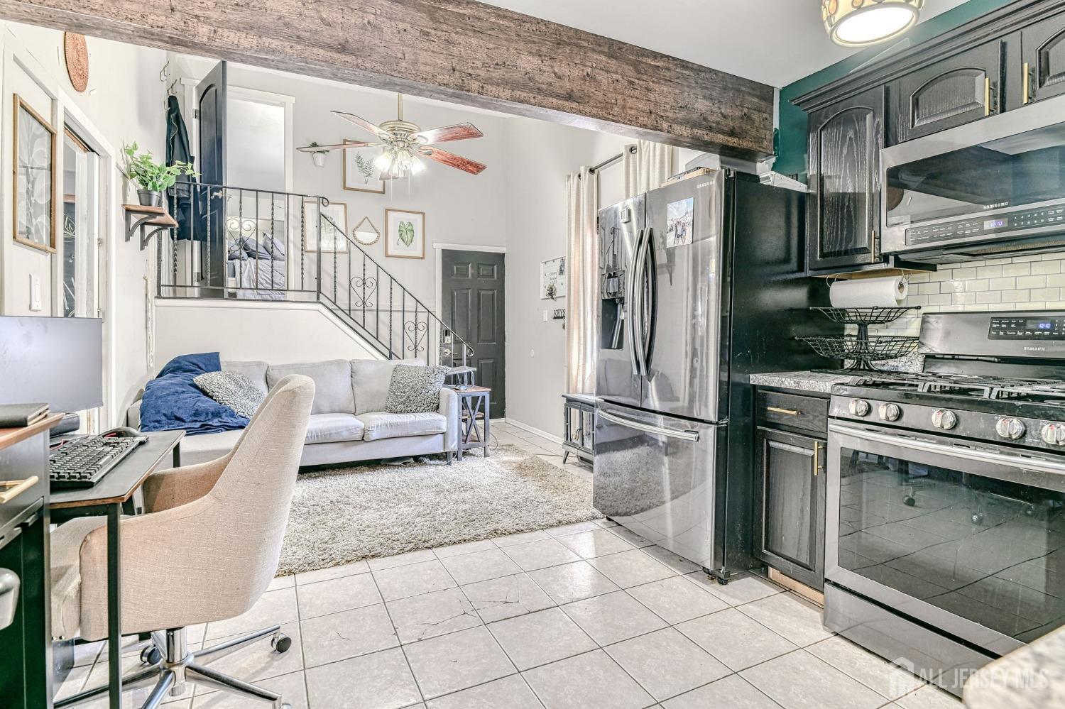 52 Owens Road Old Bridge, NJ 08857 - Photo 20 of 39 a kitchen with stainless steel appliances granite countertop a refrigerator and a stove top oven