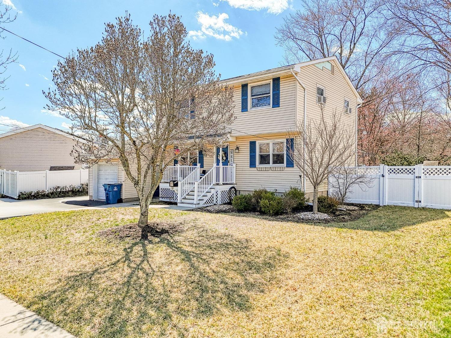 52 Owens Road Old Bridge, NJ 08857 - Photo 2 of 39 a front view of house with yard and trees