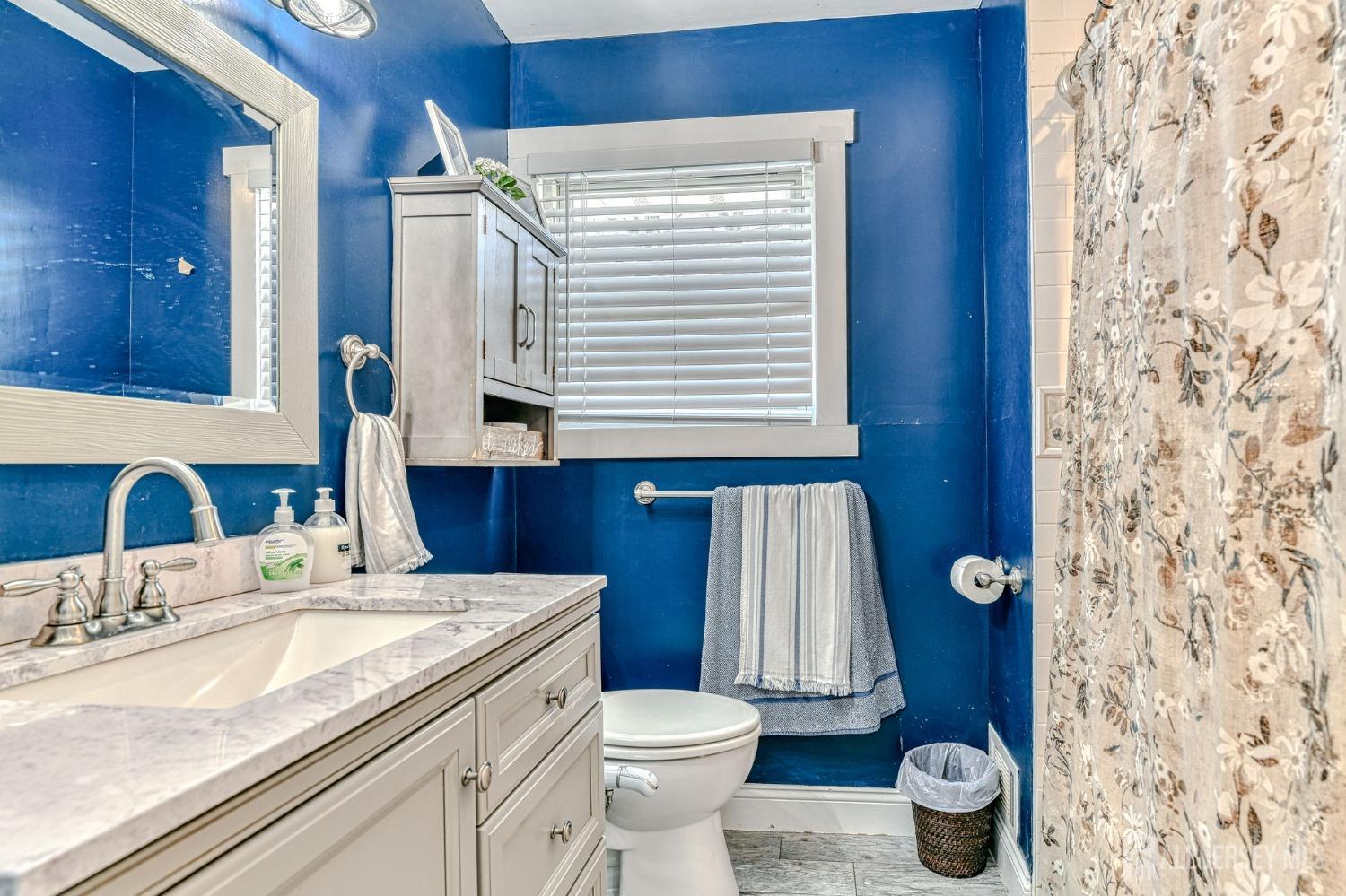 52 Owens Road Old Bridge, NJ 08857 - Photo 27 of 39 a bathroom with a granite countertop sink toilet and a mirror