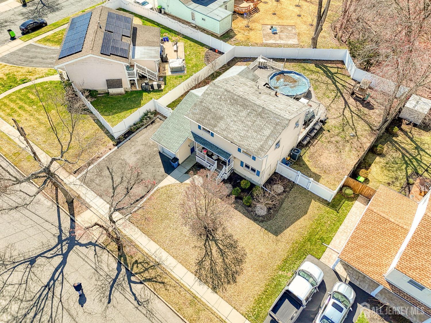 52 Owens Road Old Bridge, NJ 08857 - Photo 36 of 39 a view of a house with pool and sitting area