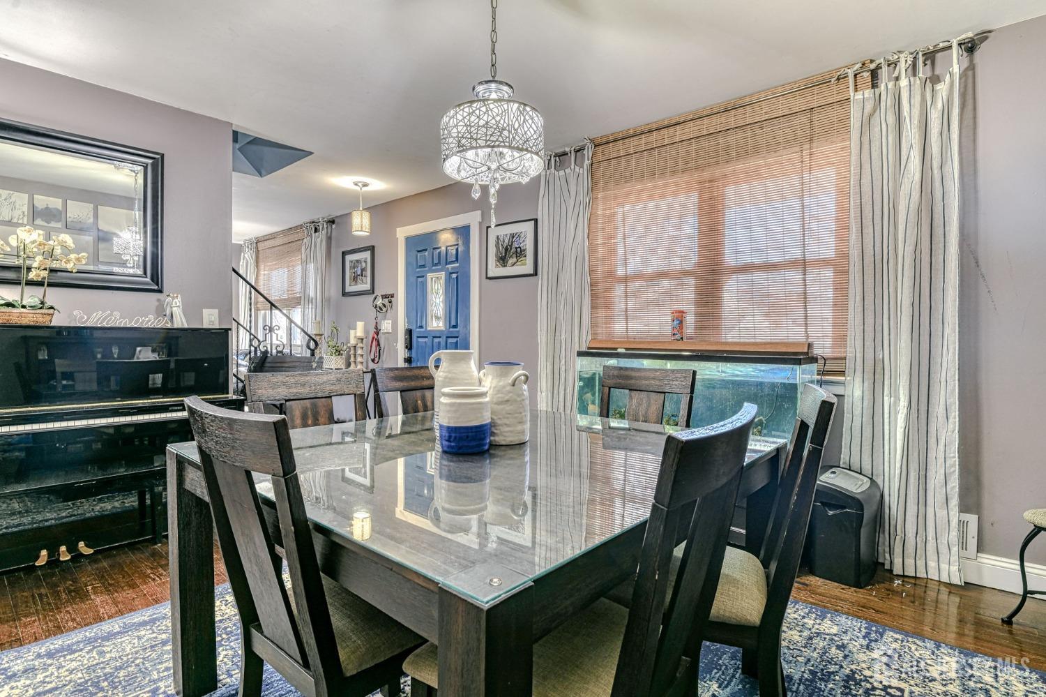 52 Owens Road Old Bridge, NJ 08857 - Photo 10 of 39 a dining room with furniture a rug and wooden floor