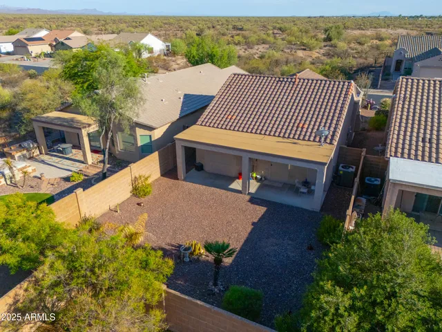 an aerial view of a house with balcony
