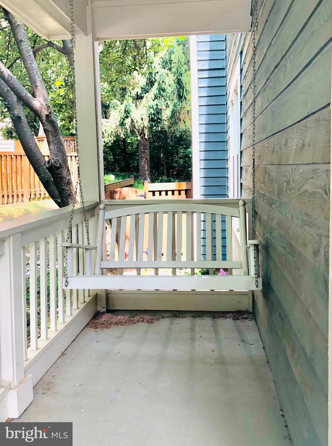 1635 Oak Spring Way Reston, VA 20190 - Photo 3 of 33 ENJOY WARM SUMMER EVENINGS ON THE FRONT PORCH