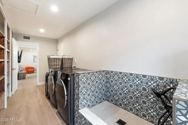 a view of a swimming pool and a yard