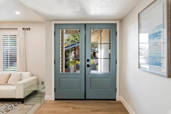 a view of livingroom with furniture and windows