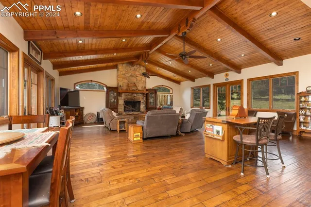 a living room with furniture and a table