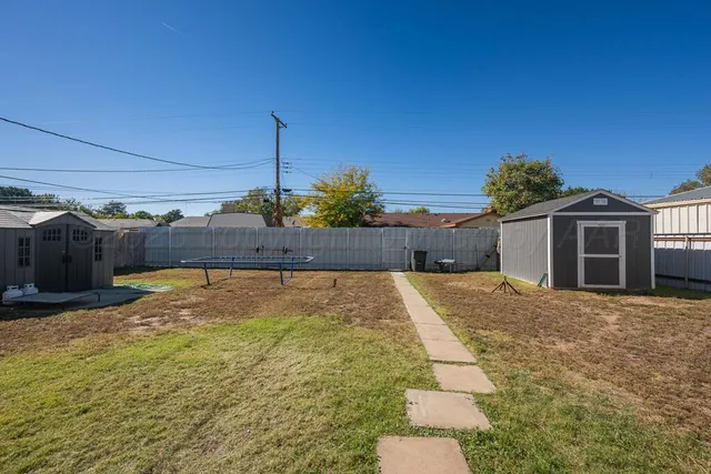 a swimming pool with yard
