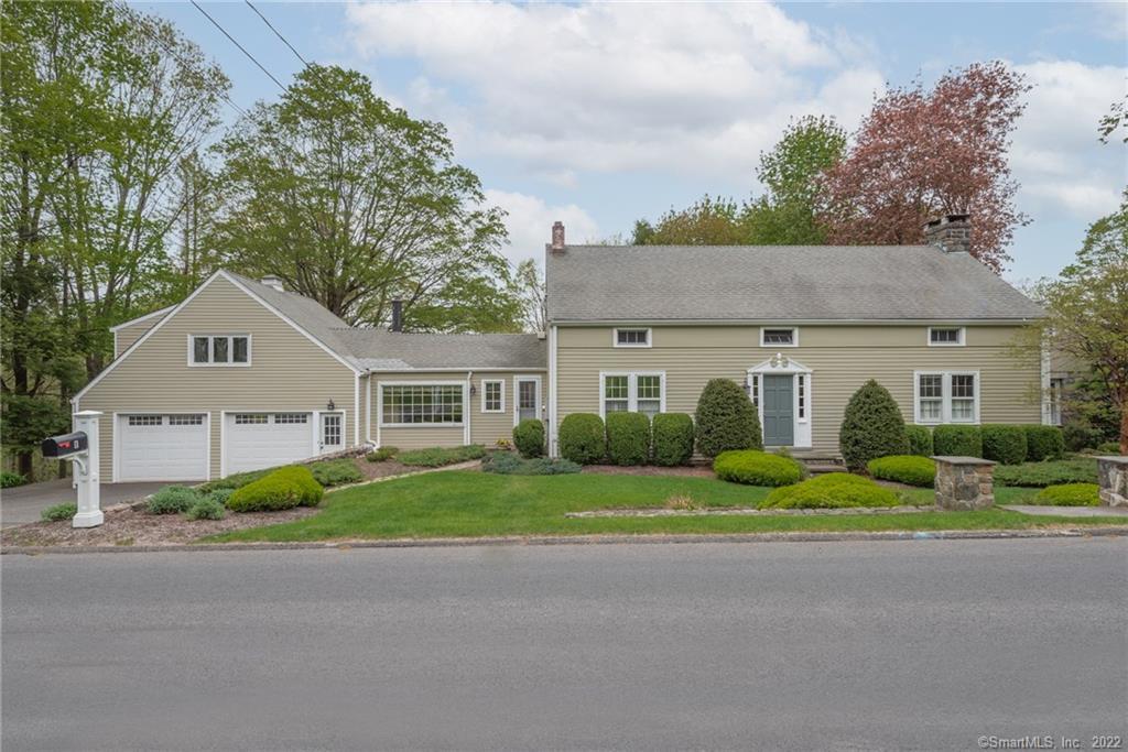 6 Hanover Road Newtown, CT 06470 - Photo 1 of 1 a front view of a house with a garden