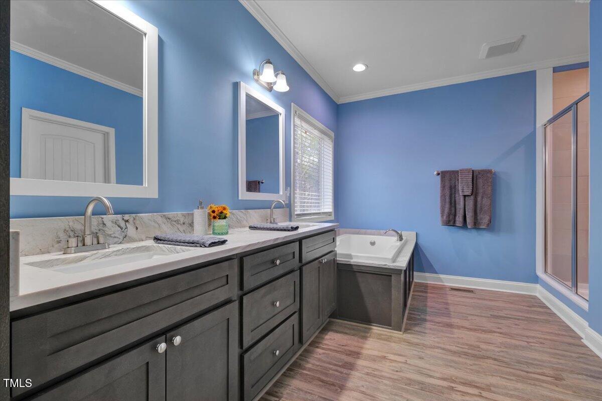 90 Ferncrest Court Roxboro, NC 27574 - Photo 23 of 45 a bathroom with a sink and a mirror