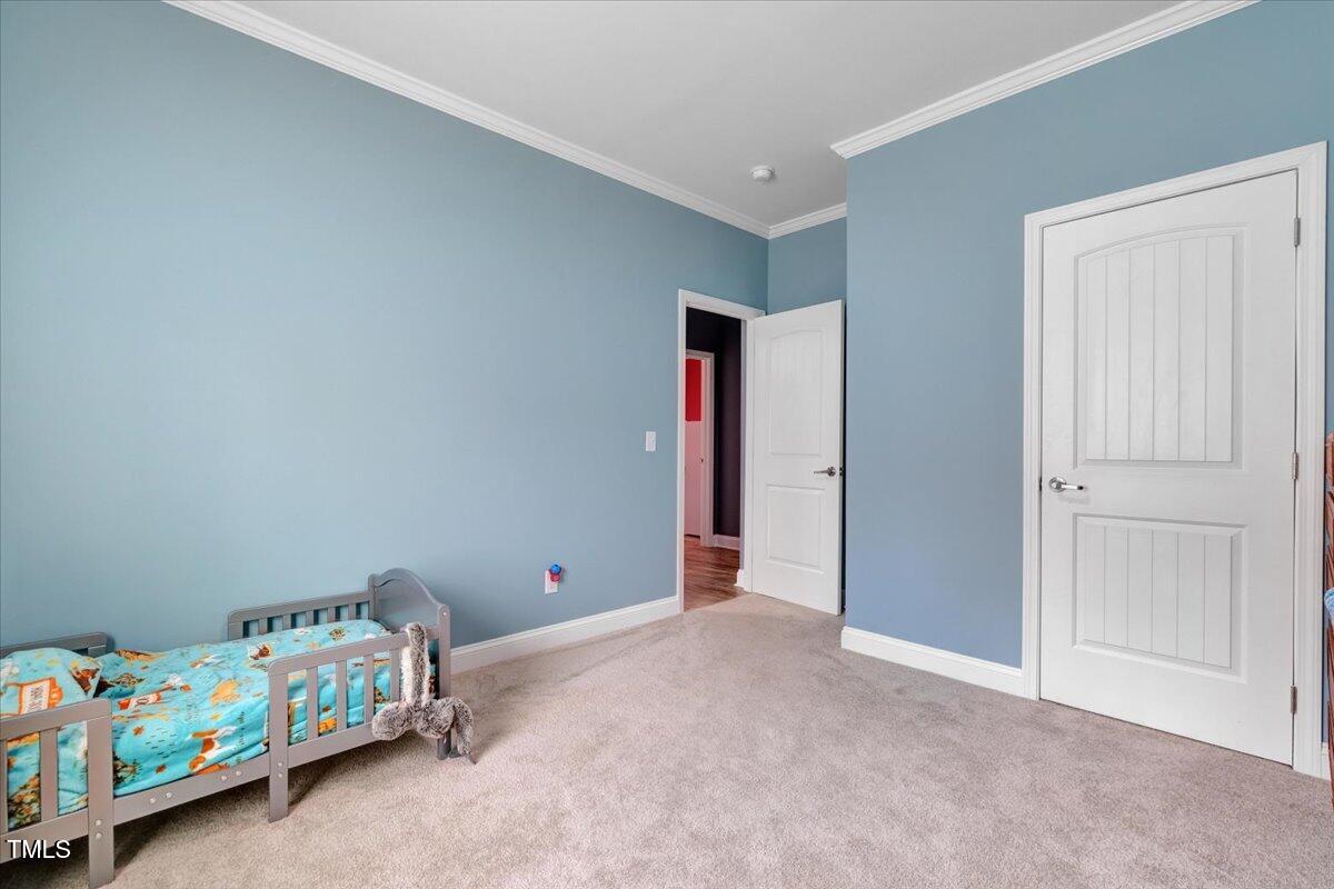 90 Ferncrest Court Roxboro, NC 27574 - Photo 31 of 45 a bedroom with a bed and a window