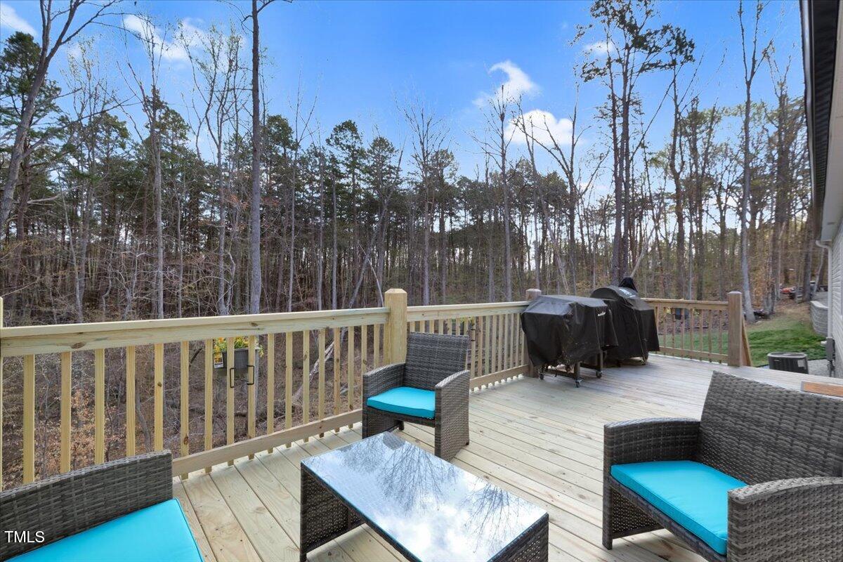 90 Ferncrest Court Roxboro, NC 27574 - Photo 35 of 45 a view of a deck with furniture