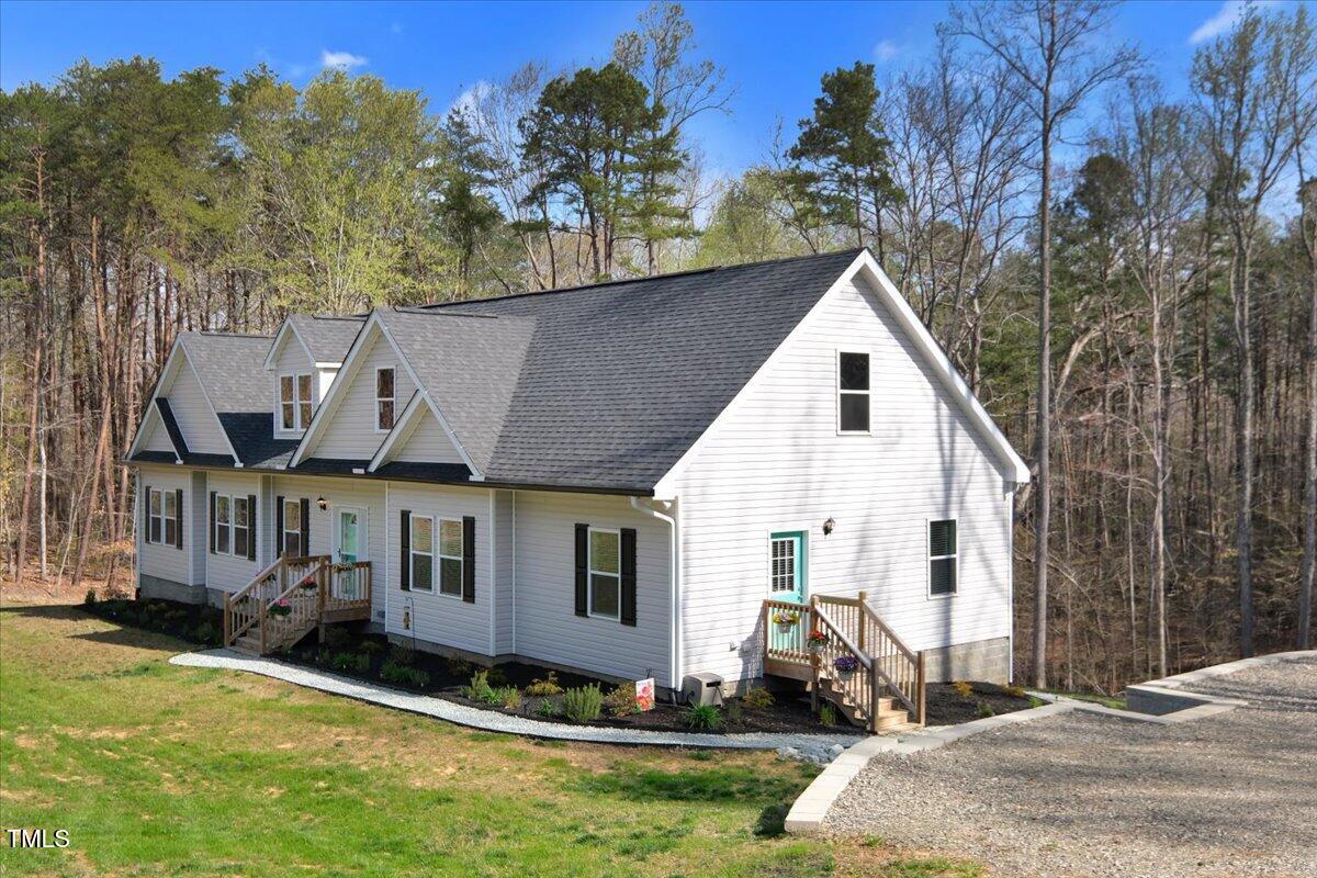 90 Ferncrest Court Roxboro, NC 27574 - Photo 4 of 45 a view of a yard in front of house