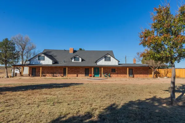 front view of a house with a patio
