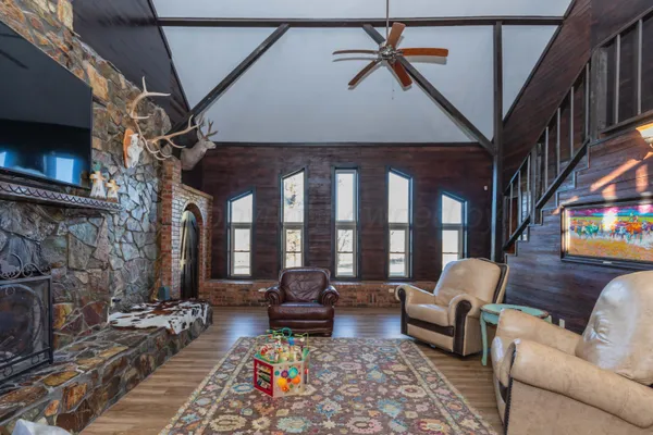 a view of walk in closet with clothes