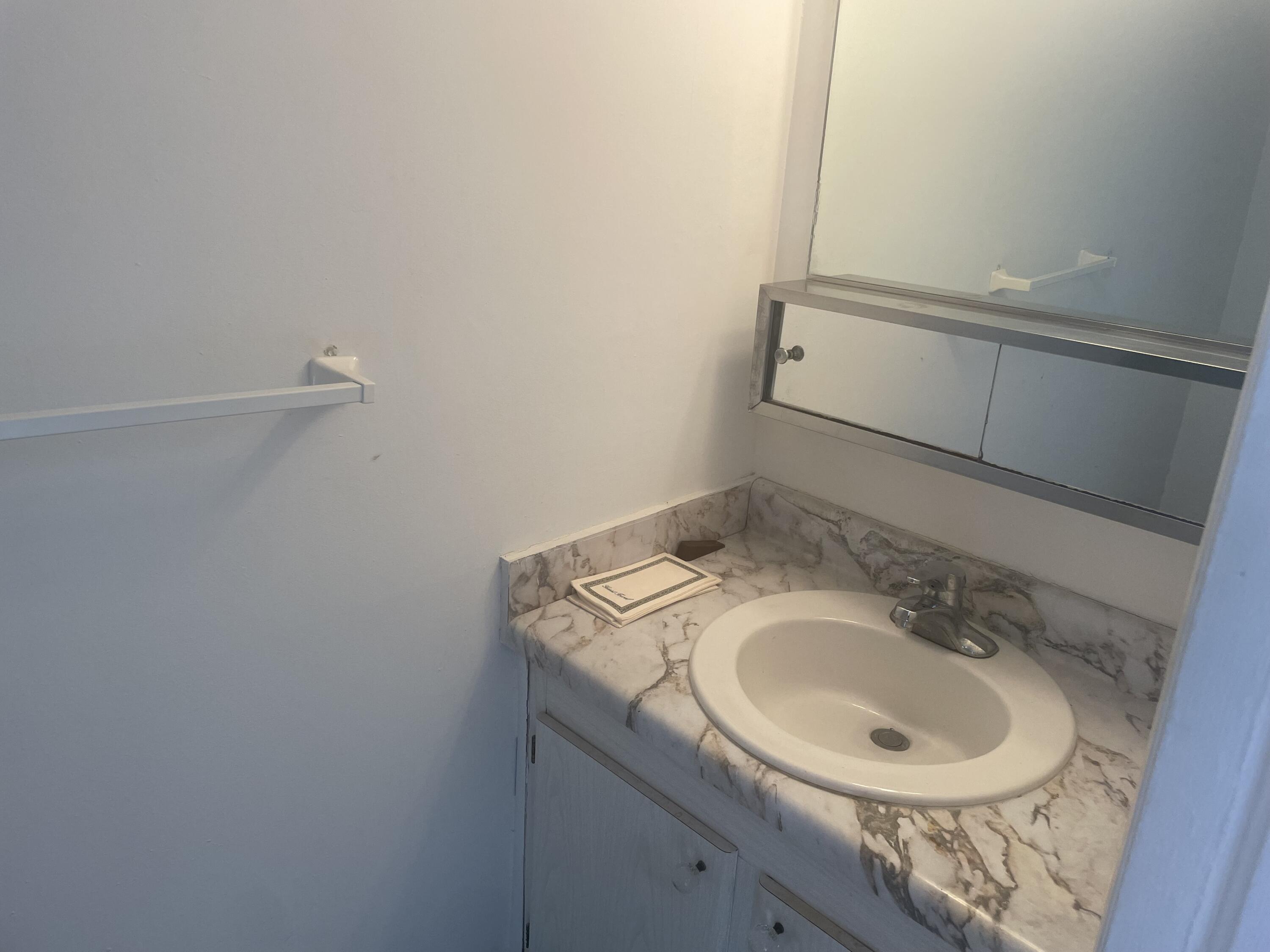 20 Golfs Edge, Unit E West Palm Beach, FL 33417 - Photo 2 of 7 Front