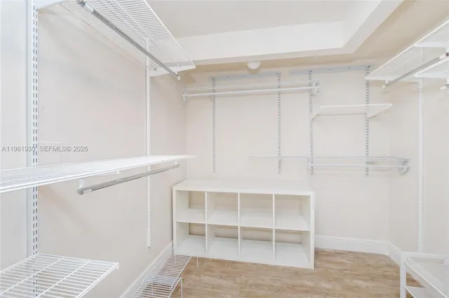 a view of an empty walk in closet