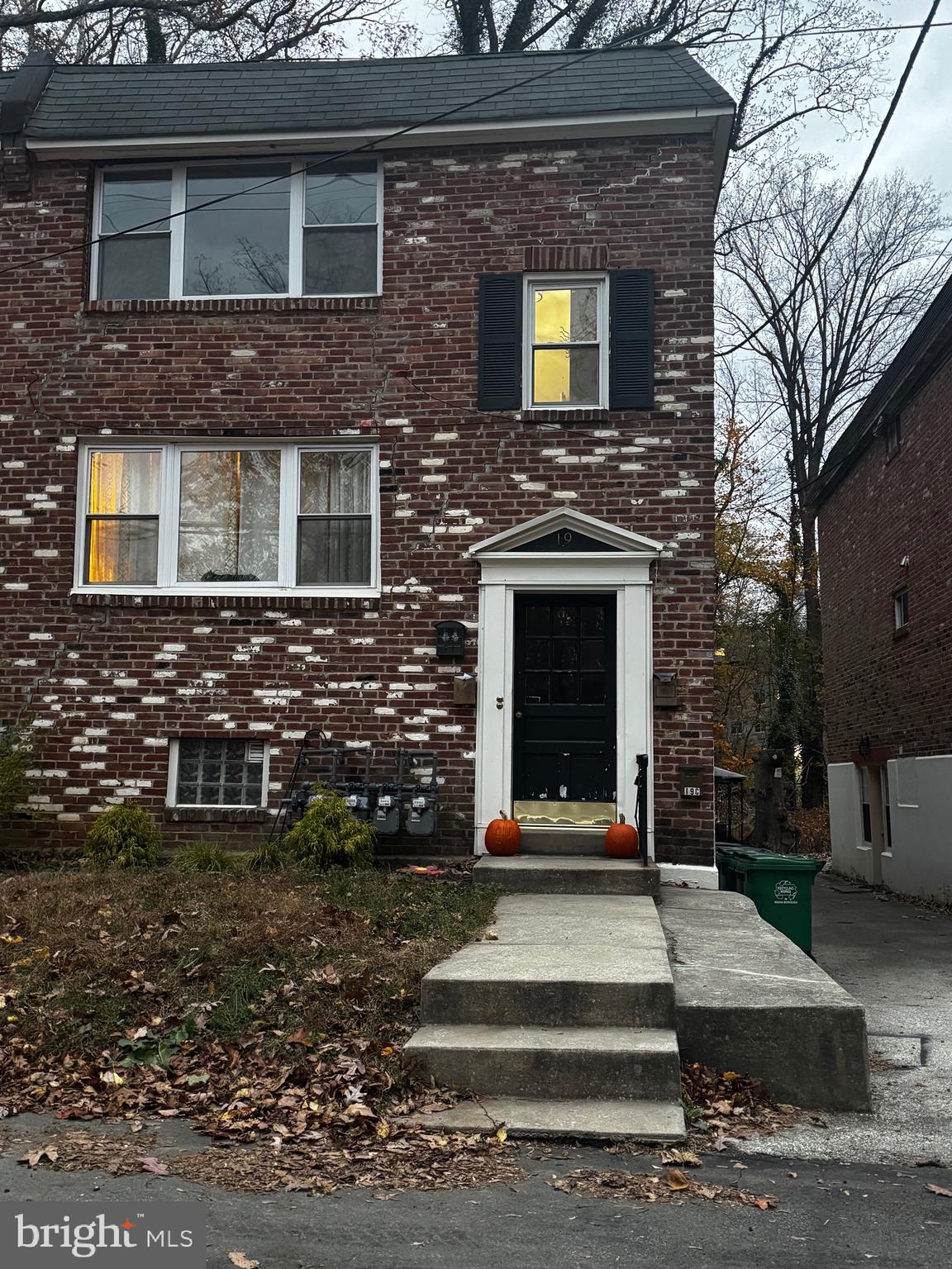 19 East Lincoln Street, Unit B Media, PA 19063 - Photo 1 of 14 a front view of a house with a yard