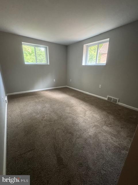 19 East Lincoln Street, Unit B Media, PA 19063 - Photo 10 of 14 an empty room with windows