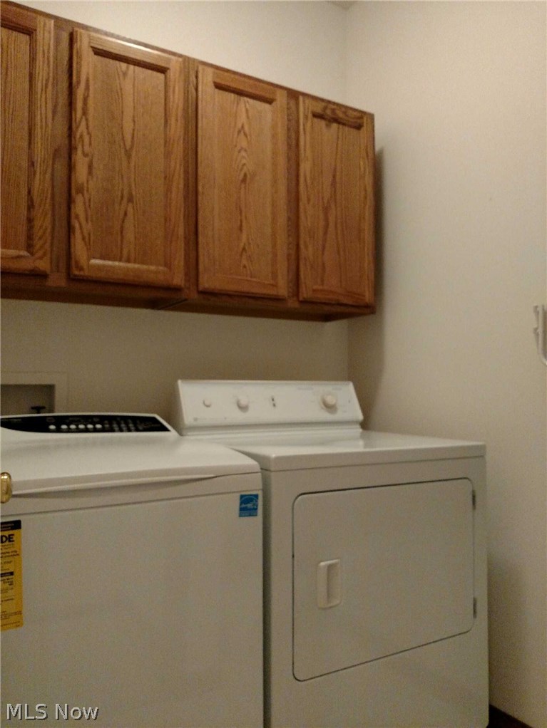2608 Charing Cross Road Northwest Canton, OH 44708 - Photo 18 of 24 Washer/ dryer and laundry tub are conveniently across from Master Suite.