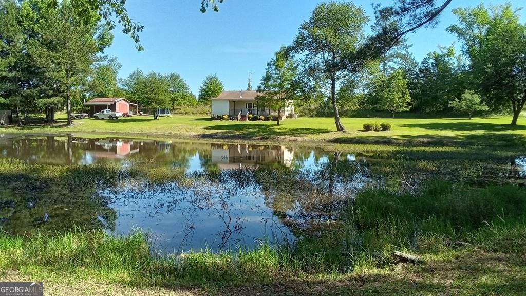 1183 Bay Springs Church Road Adrian, GA 31002 - Photo 1 of 1 a view of a lake view