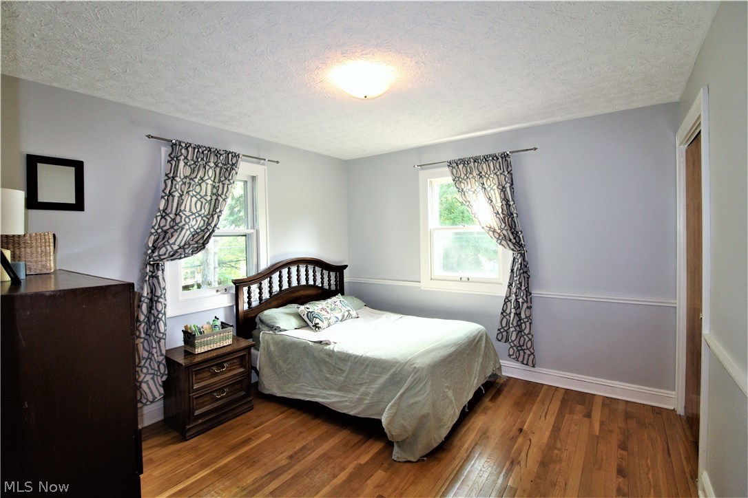 2887 Lee Road Silver Lake, OH 44224 - Photo 14 of 24 Bedroom 2 with Hardwood Floor