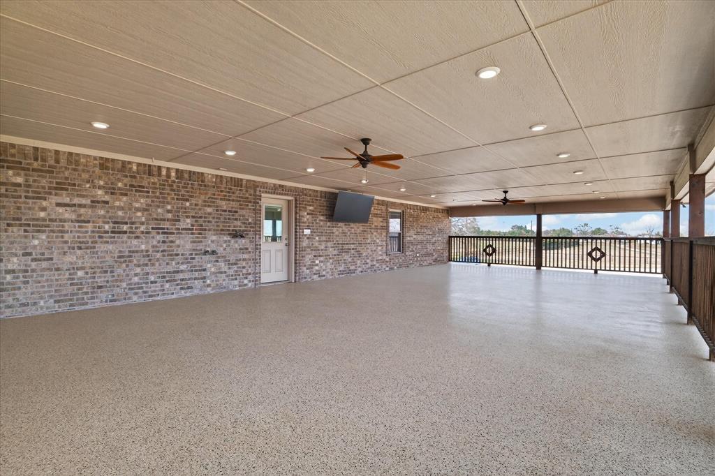 790 Bones Chapel Road Whitesboro, TX 76273 - Photo 37 of 39 a view of a projector room with a ceiling fan