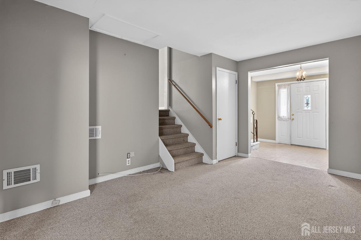 24 Moryan Road Edison, NJ 08817 - Photo 15 of 33 a view of an empty room with stairs
