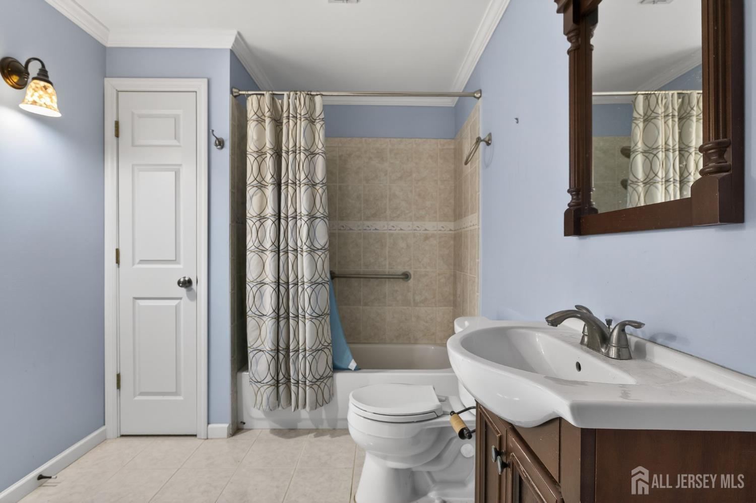 24 Moryan Road Edison, NJ 08817 - Photo 17 of 33 a bathroom with a sink toilet and shower