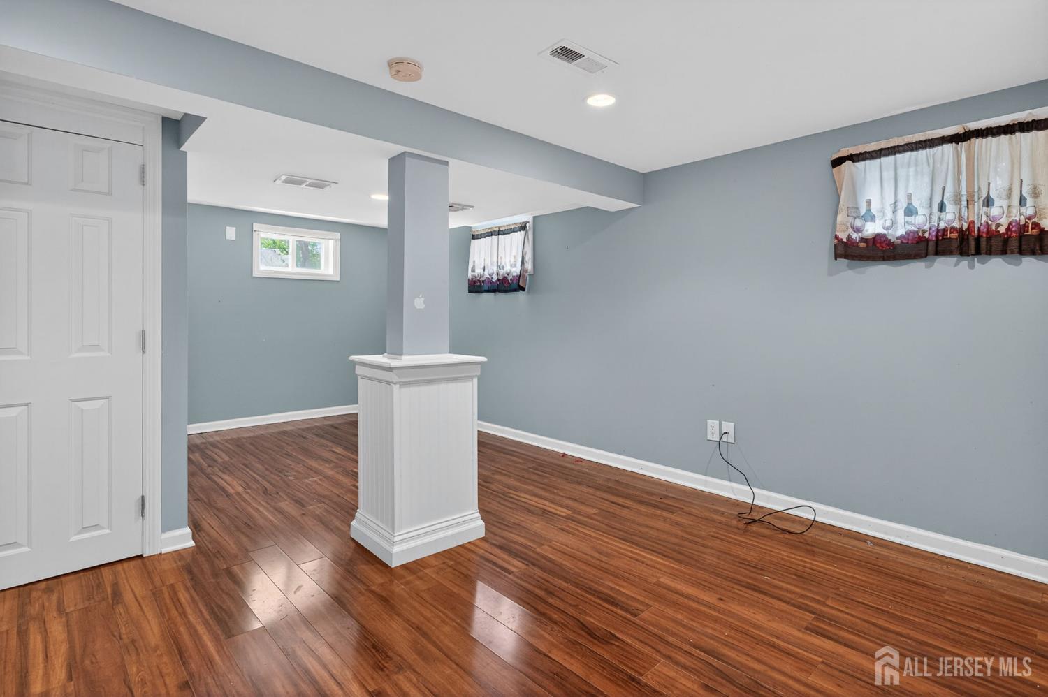 24 Moryan Road Edison, NJ 08817 - Photo 19 of 33 a view of empty room with wooden floor and window
