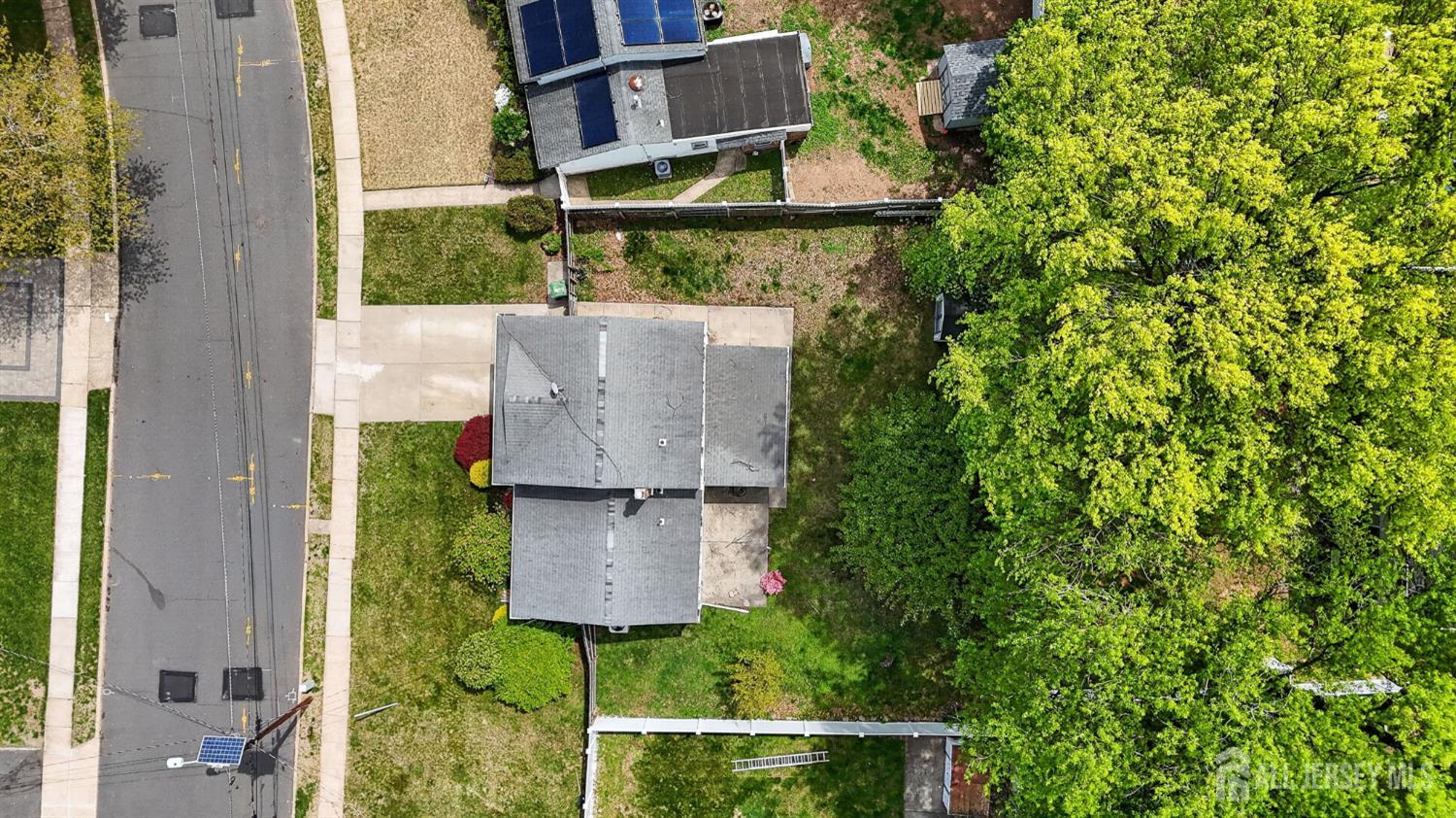 24 Moryan Road Edison, NJ 08817 - Photo 28 of 33 an aerial view of a house with swimming pool and garden