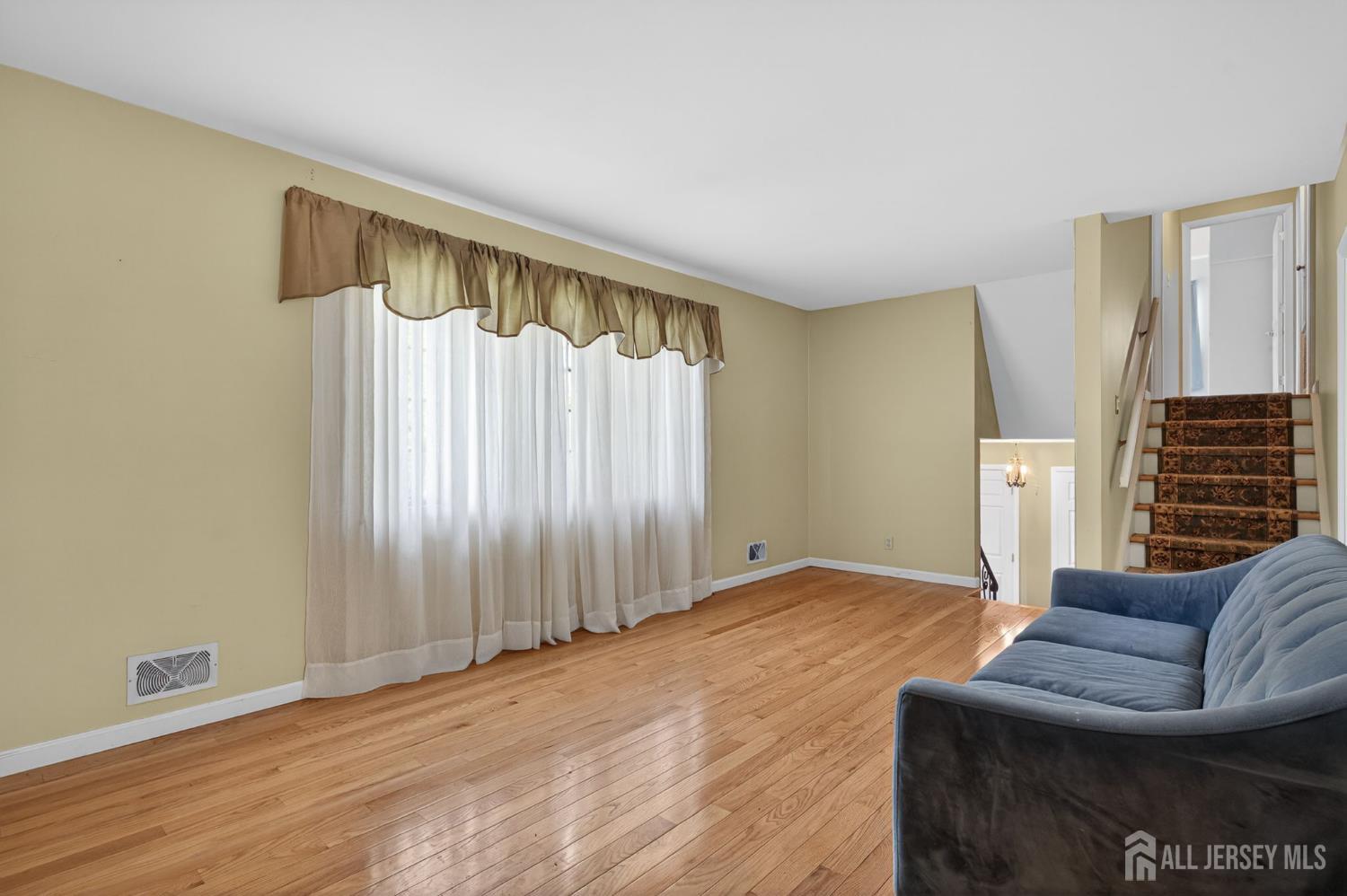24 Moryan Road Edison, NJ 08817 - Photo 5 of 33 a view of livingroom with furniture and window